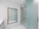 Bathroom featuring a glass shower and vanity with mirror at 100 1St N Ave # 2703, St Petersburg, FL 33701