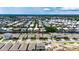 Wide aerial shot showcasing waterfront homes on canals, with mature landscaping and scenic views of the surrounding area at 1028 Signet Dr, Apollo Beach, FL 33572