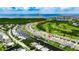Aerial view of neighborhood with waterfront homes, easy access to the ocean, and golf course at 1028 Signet Dr, Apollo Beach, FL 33572
