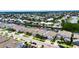 Aerial view of homes bordering a canal, featuring well-maintained landscaping and convenient access to the water at 1028 Signet Dr, Apollo Beach, FL 33572