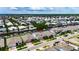 Aerial view of a lovely community with homes bordering the waterways, beautiful landscaping, and easy water access at 1028 Signet Dr, Apollo Beach, FL 33572