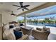 Beautifully designed patio with comfortable seating overlooking the pool area at 1028 Signet Dr, Apollo Beach, FL 33572