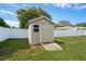 Exterior view of yard shed with ramp and window on well maintained property at 1038 Shenandoah Ln, Spring Hill, FL 34606