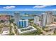 Scenic aerial view of downtown buildings near the waterfront with clear skies and blue ocean water at 105 4Th Ne Ave # 426, St Petersburg, FL 33701