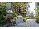 Built-in BBQ grill in outdoor space surrounded by lush landscaping and patio area at 105 4Th Ne Ave # 426, St Petersburg, FL 33701