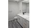 Updated bathroom features modern fixtures, vanity, and a neutral color palette for a clean, contemporary look at 1107 Queen Anne Dr # C, Palm Harbor, FL 34684