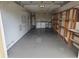 Garage space with washer, dryer, shelving and lots of storage space at 1107 Queen Anne Dr # C, Palm Harbor, FL 34684