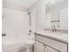 Bathroom featuring a bathtub, shower and granite countertop at 11222 Clayridge Dr, Tampa, FL 33635
