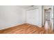 Bedroom featuring wood-look floors, a double closet and doorway access at 11222 Clayridge Dr, Tampa, FL 33635