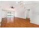 Spacious living area with vaulted ceilings, laminate flooring, and natural light at 11222 Clayridge Dr, Tampa, FL 33635