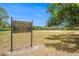 A neighborhood park with a baseball field and a grassy field on a private property at 11222 Clayridge Dr, Tampa, FL 33635