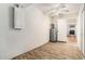 A bright storage room featuring a ceiling fan and leading to the kitchen at 11222 Clayridge Dr, Tampa, FL 33635