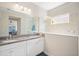Bathroom with double sink, granite countertops, tile backsplash, and glass shower enclosure at 11429 Drifting Leaf Dr, Riverview, FL 33579