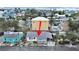 Aerial view of the property, showcasing its proximity to neighboring homes and nearby community at 131 92Nd Ave, Treasure Island, FL 33706