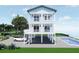 Charming house featuring a private pool and multi-level balconies for optimal outdoor enjoyment at 131 92Nd Ave, Treasure Island, FL 33706