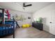 Bedroom featuring a bunk bed, dresser, hardwood floors, and natural light at 13514 Oval W Dr, Largo, FL 33774