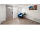 Welcoming foyer with wood floors, neutral paint, and ample natural light at 13514 Oval W Dr, Largo, FL 33774