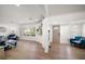 Open floor plan featuring wood floors, recessed lighting, and plantation shutters at 13514 Oval W Dr, Largo, FL 33774