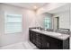 Bathroom features double vanity, granite countertops, and ample cabinet space at 146 Rain Berry Ave, Ruskin, FL 33570