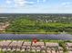 Beautiful aerial view highlighting the property's serene waterfront location and stunning natural surroundings at 1622 Lago Vista Blvd, Palm Harbor, FL 34685