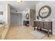 Spacious bathroom with dual vanities, a luxurious soaking tub, and bright lighting, creating a spa-like atmosphere at 1622 Lago Vista Blvd, Palm Harbor, FL 34685