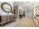 Expansive bathroom boasting dual vanities, a large mirror, and a glass-enclosed shower for ultimate comfort at 1622 Lago Vista Blvd, Palm Harbor, FL 34685