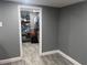 Spacious walk-in closet with ample shelving and storage, offering organized solutions at 1631 St Mary Dr, Dunedin, FL 34698