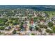 An aerial view of a quiet residential neighborhood with lush greenery and well-maintained homes at 1706 Sloop Pl, Brandon, FL 33511