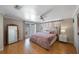 Serene bedroom with a plush bed, natural light, and stylish decor, creating a relaxing retreat at 1706 Sloop Pl, Brandon, FL 33511