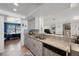 Open kitchen with granite countertops, stainless steel dishwasher, and breakfast bar at 1706 Sloop Pl, Brandon, FL 33511