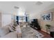 Relaxing living room with tile and hardwood floors, ceiling fan, and lots of natural light perfect at 1706 Sloop Pl, Brandon, FL 33511