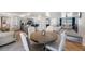 Open-concept living space with a modern kitchen and cozy living area, great for entertaining guests at 1706 Sloop Pl, Brandon, FL 33511