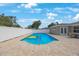 Enjoy the backyard oasis with a beautiful in-ground pool at 1706 Sloop Pl, Brandon, FL 33511