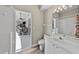 Bathroom featuring white sink and a walk in shower at 18017 Palm Breeze Dr, Tampa, FL 33647
