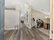 Inviting hallway showcases modern wood flooring and stylish built-in display shelves at 18017 Palm Breeze Dr, Tampa, FL 33647