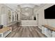 Bright and airy living room with high ceilings and an open floor plan flowing into the kitchen at 18017 Palm Breeze Dr, Tampa, FL 33647