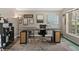 A well-lit office space features a large desk, neutral colors, and a large window at 18017 Palm Breeze Dr, Tampa, FL 33647