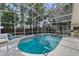 Inviting screened pool with spa, perfect for outdoor relaxation at 18017 Palm Breeze Dr, Tampa, FL 33647