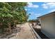 Gravel walkway and landscaping in the backyard at 1813 Allegheny Dr, Sun City Center, FL 33573