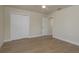 Bedroom with tile floors, closet, and neutral paint offers a clean and inviting atmosphere at 2010 Bayview Pl, Indian Rocks Beach, FL 33785