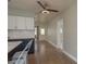 Bright kitchen with a view of the living space, modern appliances, and ample counter space at 2010 Bayview Pl, Indian Rocks Beach, FL 33785