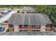 Aerial view of apartment building exterior with parking at 21032 Voyager Blvd # 8, Land O Lakes, FL 34638
