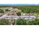 Aerial view of the complex, showing pool, parking, and lush greenery at 21032 Voyager Blvd # 8, Land O Lakes, FL 34638