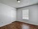 Bright bedroom has a window with blinds and closet at 21032 Voyager Blvd # 8, Land O Lakes, FL 34638