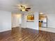 Open living area featuring hardwood floors with a kitchen view at 21032 Voyager Blvd # 8, Land O Lakes, FL 34638
