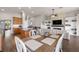 Open concept layout with dining area, kitchen, and living room, great for entertaining at 2350 126Th E Dr, Parrish, FL 34219