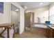 Bathroom featuring a soaking tub, walk-in shower, and a separate water closet at 2350 126Th E Dr, Parrish, FL 34219