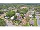 Bird's eye view of a residential area, featuring a house with a red tile roof and solar panels on the roof at 2616 11Th N St, St Petersburg, FL 33704