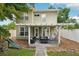 A backyard featuring a cozy patio, a swing chair, outdoor seating, and a playset at 2616 11Th N St, St Petersburg, FL 33704