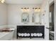 Spa-like bathroom with double vanity, and freestanding tub at 2616 11Th N St, St Petersburg, FL 33704